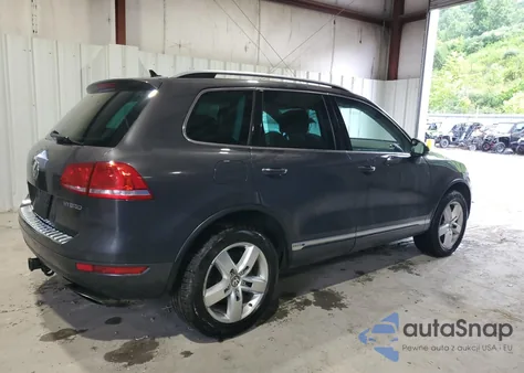 2011 Volkswagen Touareg Hybrid from USA, damaged, VIN WVGFG9BP2BD004319